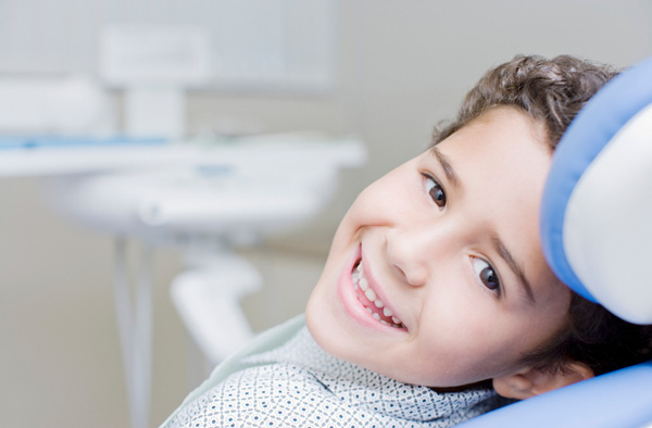 Young boy smiling with healthy teeth